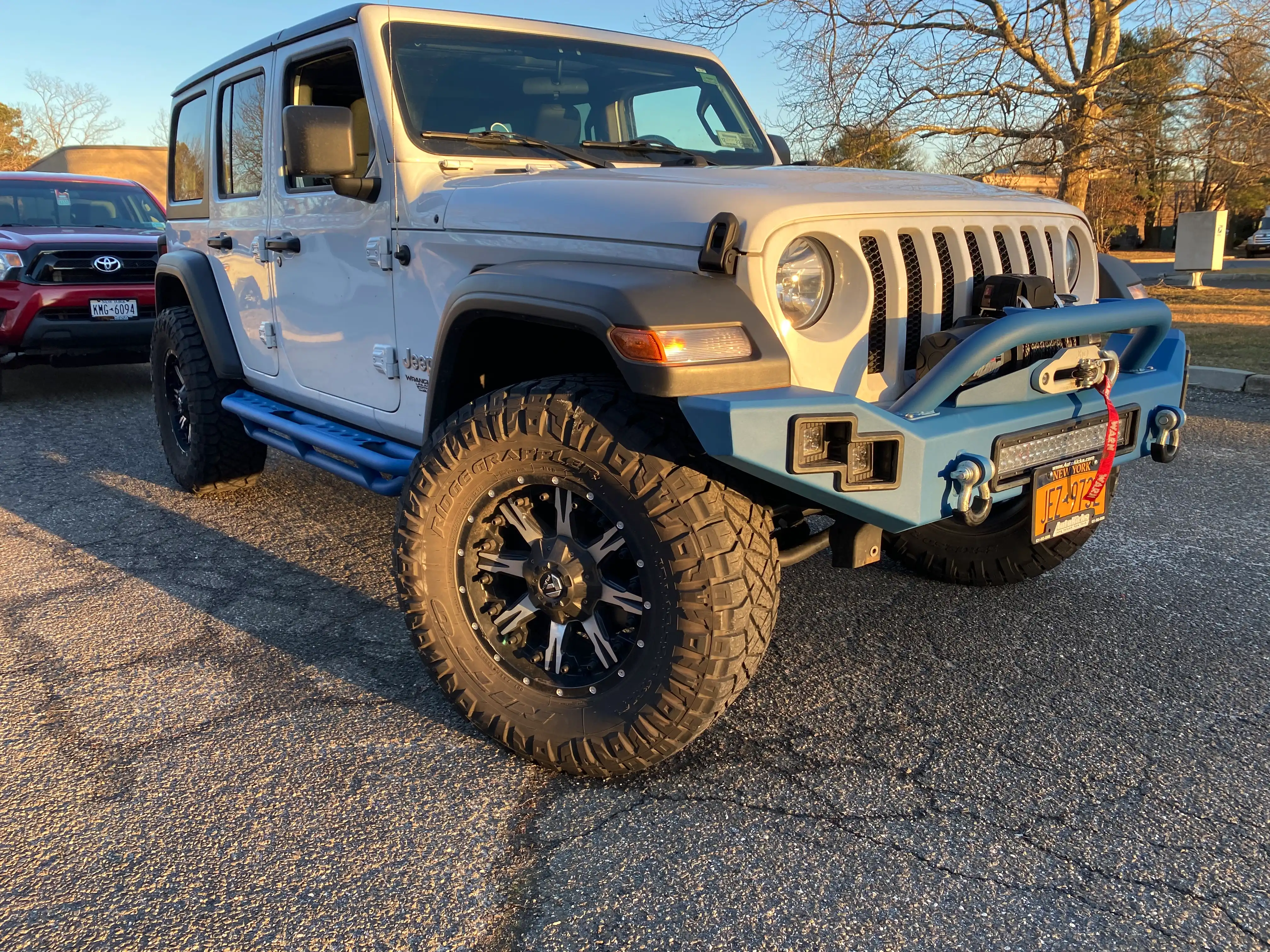 Jeep with custom bumper by Autokicks