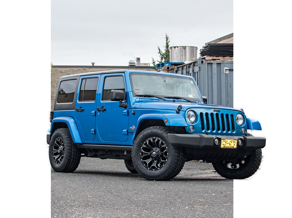 Jeep Wrangler leveled with Fuel wheels and Nitto tire package by Autokicks
