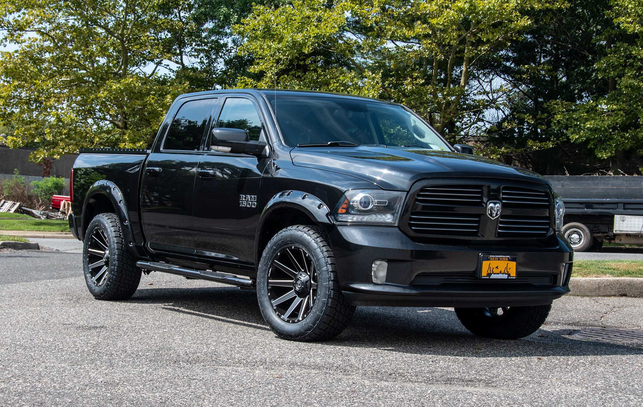 Black Ram 1500 with tire and wheel package
