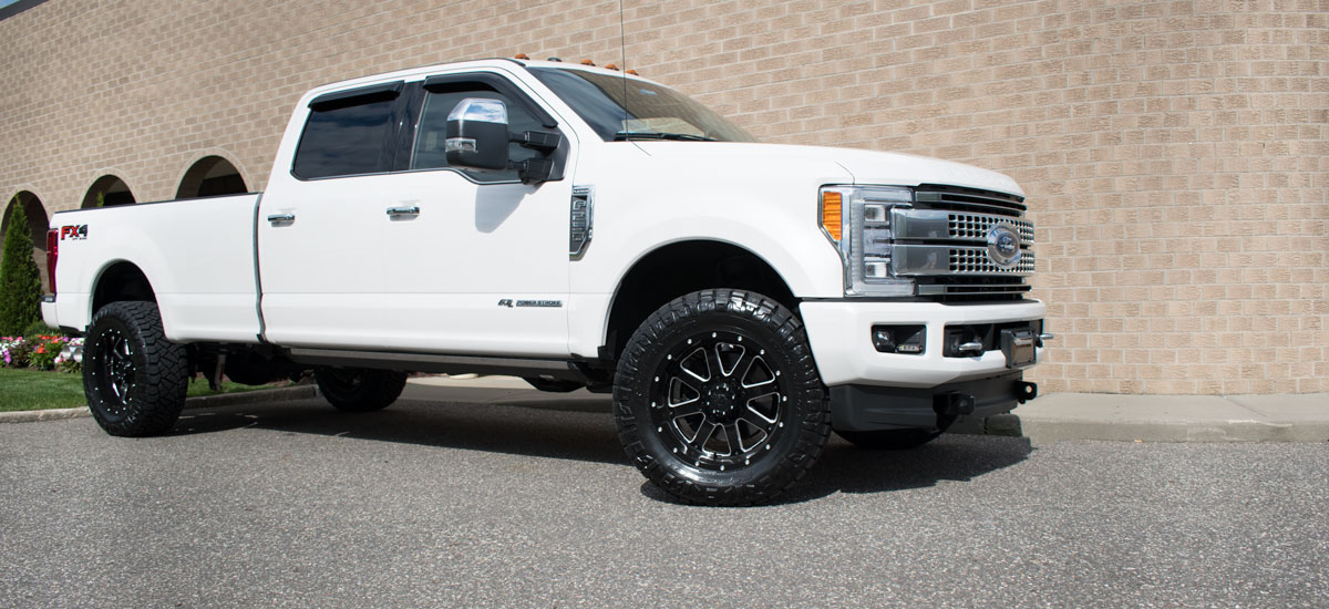 Ford F-150 with gear wheels
                             and nitto terra grappler tires